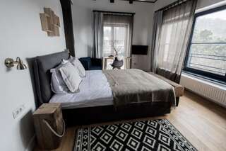 Гостевой дом The Pines Boutique Villa Брашов Двухместный номер Делюкс с 1 кроватью - Вид на сосновый лес-21